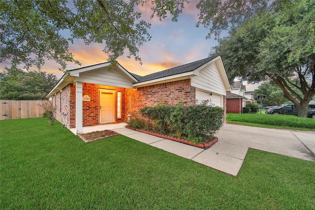 11703 Elizabeth Ct, Pinehurst, TX 77362 - ranch-style house featuring brick siding, a garage, and concrete driveway