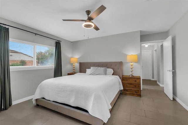 19702 Franz Rd, Houston, TX 77084 - tiled bedroom featuring baseboards and a ceiling fan
