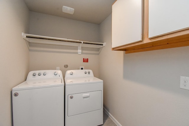 5602 Cedar Crescent Ct, Richmond, TX 77407 - laundry area with independent washer and dryer and cabinet space