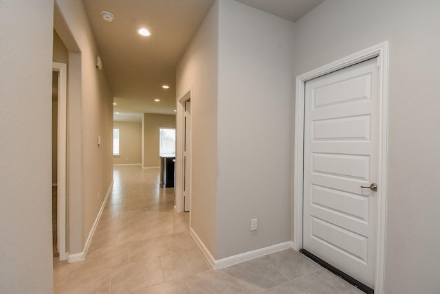 5602 Cedar Crescent Ct, Richmond, TX 77407 - hallway featuring light tile patterned flooring and recessed lighting