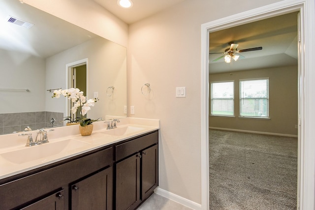 5602 Cedar Crescent Ct, Richmond, TX 77407 - full bath with double vanity and a ceiling fan