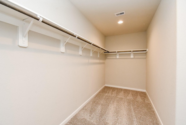 5602 Cedar Crescent Ct, Richmond, TX 77407 - walk in closet featuring carpet flooring