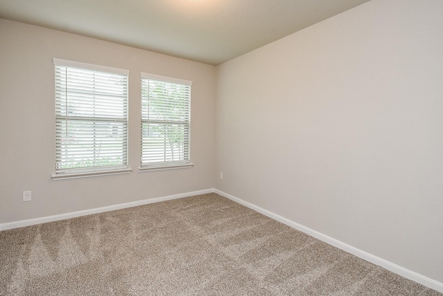 5602 Cedar Crescent Ct, Richmond, TX 77407 - empty room featuring carpet flooring and baseboards