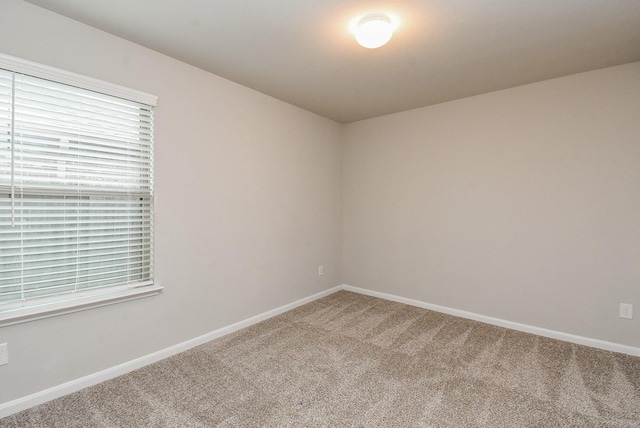 5602 Cedar Crescent Ct, Richmond, TX 77407 - carpeted spare room with baseboards
