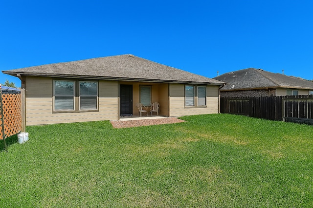 5602 Cedar Crescent Ct, Richmond, TX 77407 - back of house with a patio area and a shingled roof