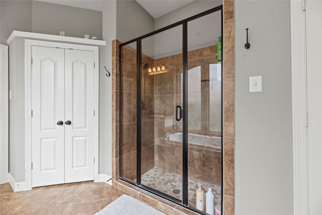 27410 Villa Mountain Ct, Fulshear, TX 77441 - bathroom with a shower stall and tile patterned floors