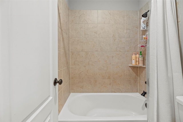 27410 Villa Mountain Ct, Fulshear, TX 77441 - bathroom featuring shower / tub combo