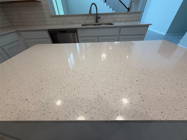 8116 Tourmaline Way, Texas City, TX 77591 - kitchen with dishwasher, tasteful backsplash, white cabinets, and light stone counters