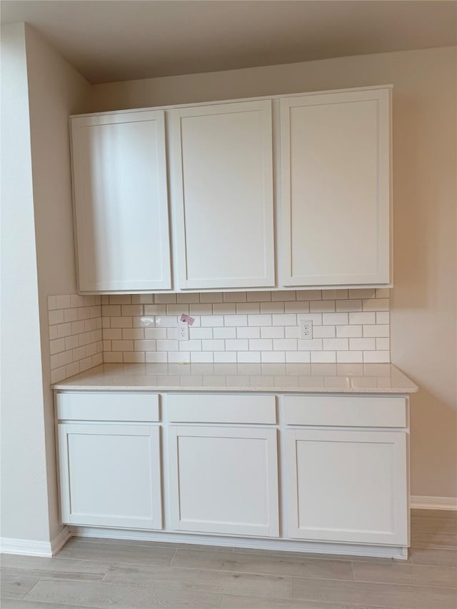 8116 Tourmaline Way, Texas City, TX 77591 - detailed view of backsplash and wood finished floors