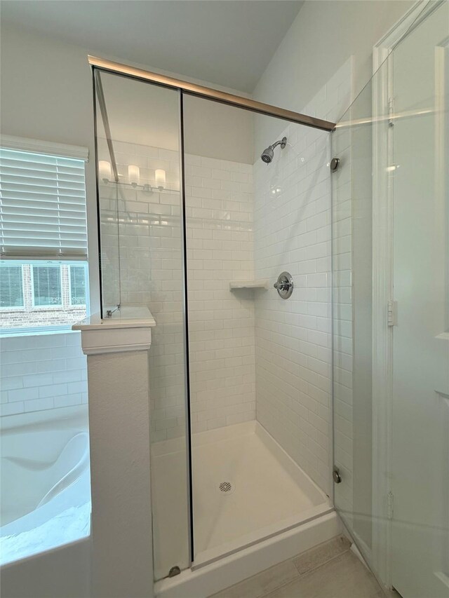 8116 Tourmaline Way, Texas City, TX 77591 - bathroom featuring a stall shower and a garden tub
