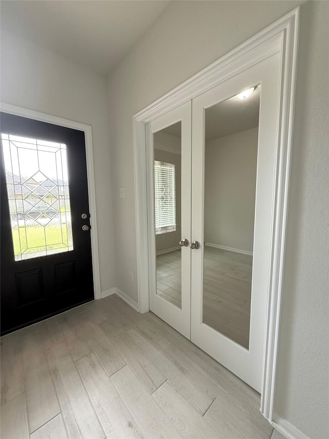 8116 Tourmaline Way, Texas City, TX 77591 - doorway to outside with french doors and light wood-style flooring