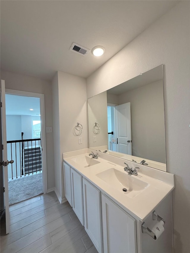 8116 Tourmaline Way, Texas City, TX 77591 - full bath featuring double vanity and wood finished floors