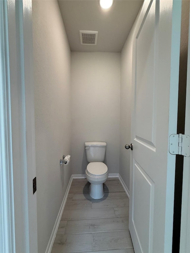 8116 Tourmaline Way, Texas City, TX 77591 - bathroom with toilet and baseboards