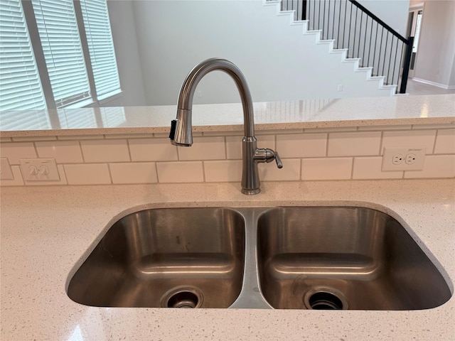 8116 Tourmaline Way, Texas City, TX 77591 - kitchen view of light stone counters and backsplash