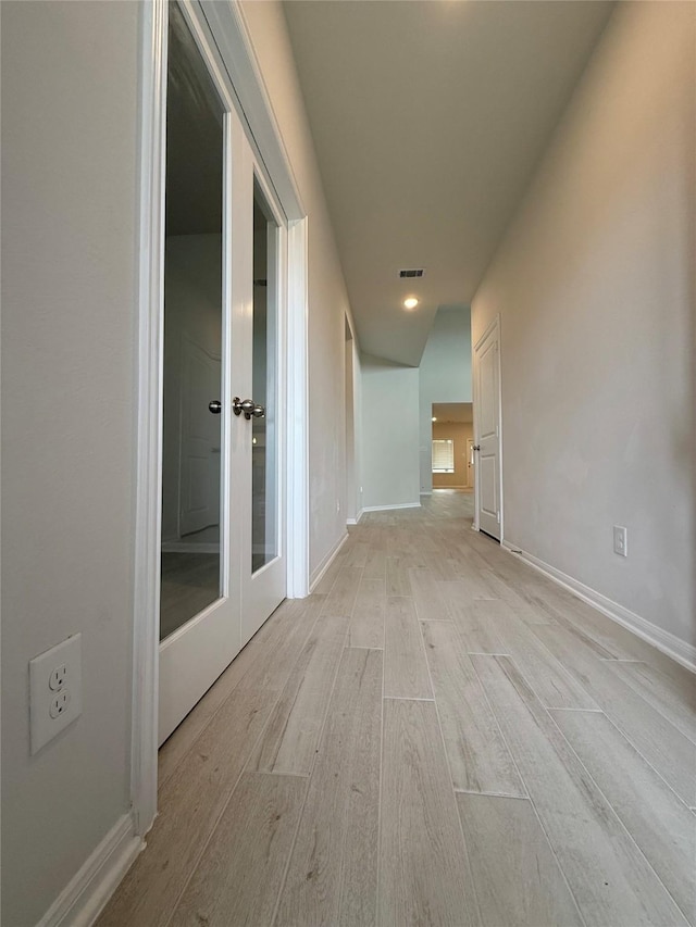 8116 Tourmaline Way, Texas City, TX 77591 - corridor featuring light wood-type flooring, recessed lighting, and french doors