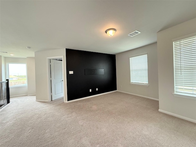 8116 Tourmaline Way, Texas City, TX 77591 - spare room featuring light carpet and a smoke detector