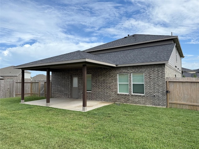 8116 Tourmaline Way, Texas City, TX 77591 - rear view of house with brick siding, a patio, a fenced backyard, and a shingled roof