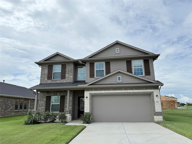 8116 Tourmaline Way, Texas City, TX 77591 - view of front of home with driveway, a front yard, brick siding, and a garage
