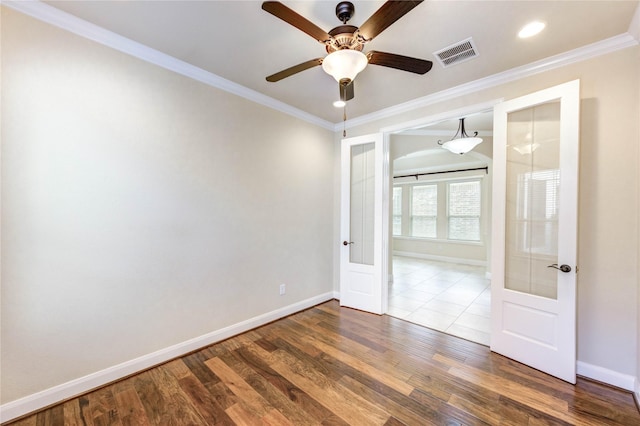 4927 Caponi Falls Ln, Katy, TX 77494 - empty room featuring a ceiling fan, wood finished floors, crown molding, and recessed lighting