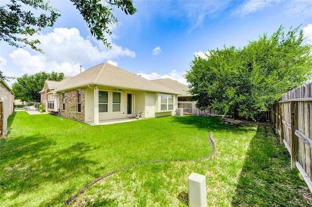 4927 Caponi Falls Ln, Katy, TX 77494 - rear view of property with a fenced backyard, ceiling fan, and a patio area