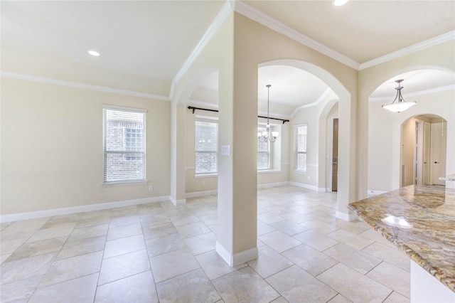 4927 Caponi Falls Ln, Katy, TX 77494 - spare room featuring crown molding, plenty of natural light, arched walkways, light tile patterned flooring, and recessed lighting