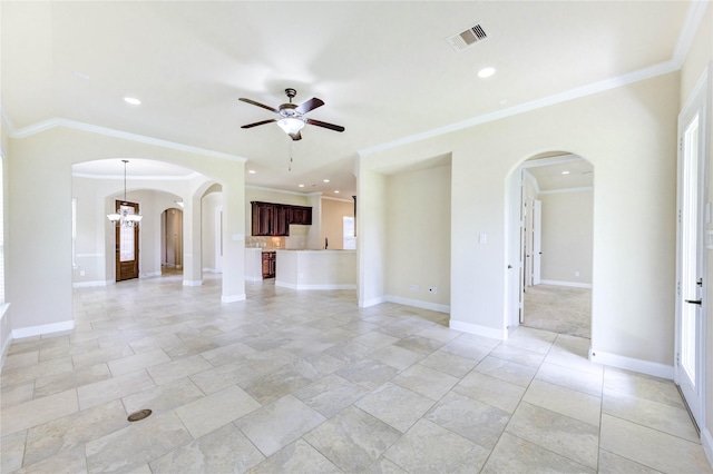 4927 Caponi Falls Ln, Katy, TX 77494 - unfurnished living room featuring arched walkways, ceiling fan, ornamental molding, recessed lighting, and a chandelier