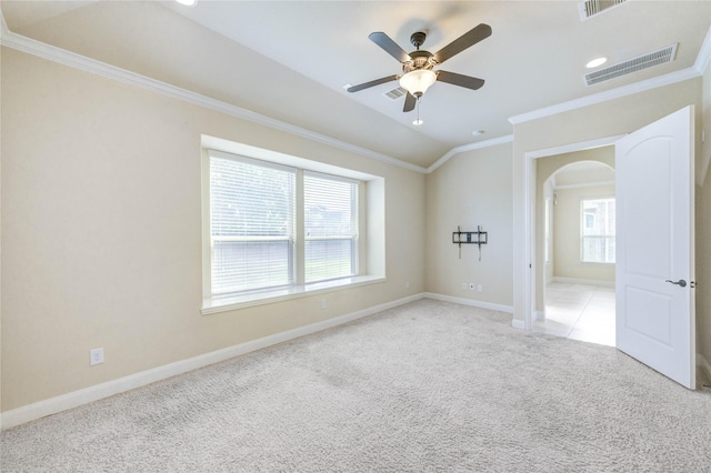 4927 Caponi Falls Ln, Katy, TX 77494 - unfurnished room featuring arched walkways, ornamental molding, ceiling fan, light carpet, and recessed lighting