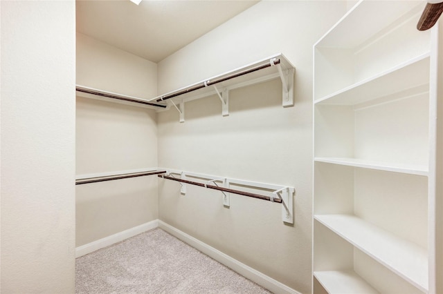 4927 Caponi Falls Ln, Katy, TX 77494 - spacious closet featuring carpet flooring
