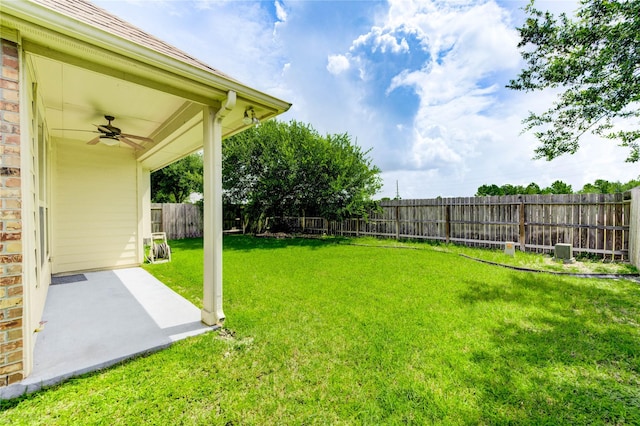 4927 Caponi Falls Ln, Katy, TX 77494 - fenced backyard with a ceiling fan and a patio area