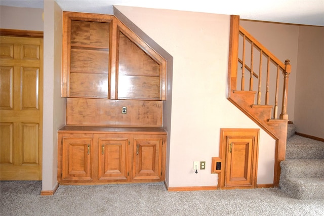 7331 Rancho Mission Dr, Houston, TX 77083 - stairs featuring carpet flooring and baseboards