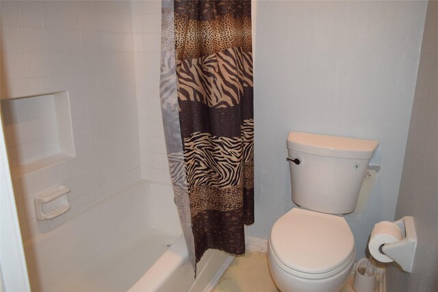 7331 Rancho Mission Dr, Houston, TX 77083 - bathroom with toilet and shower / bath combination with curtain