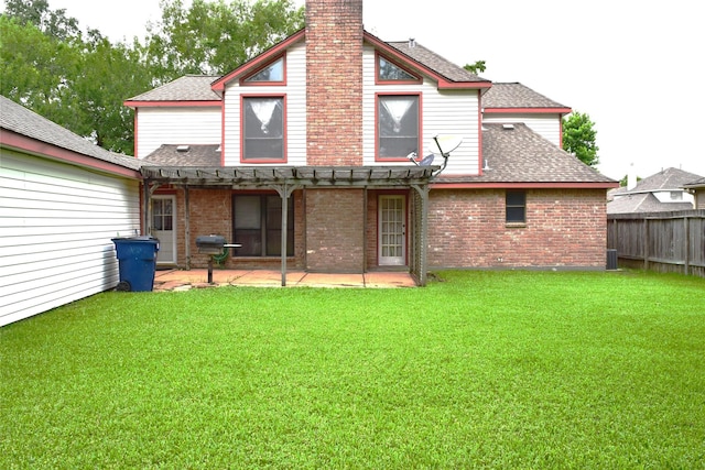 7331 Rancho Mission Dr, Houston, TX 77083 - back of property with a patio, roof with shingles, a chimney, and brick siding