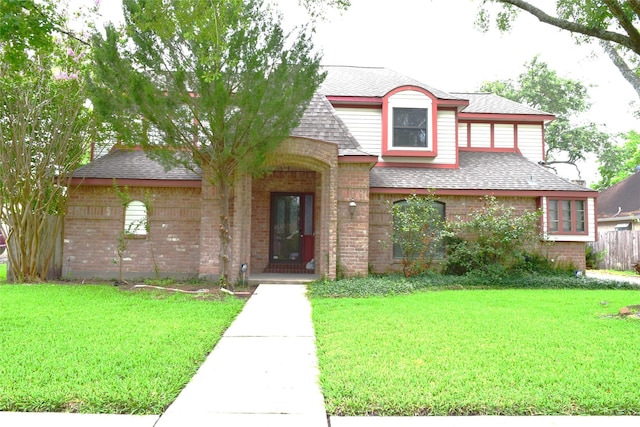 7331 Rancho Mission Dr, Houston, TX 77083 - view of front of home with brick siding and roof with shingles