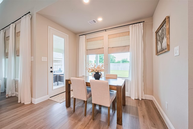 21031 Secretariat Meadow Ln, Tomball, TX 77377 - dining area featuring light wood finished floors and recessed lighting