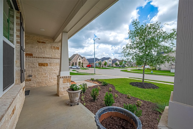 21031 Secretariat Meadow Ln, Tomball, TX 77377 - view of patio / terrace with a residential view