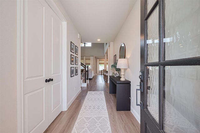21031 Secretariat Meadow Ln, Tomball, TX 77377 - hall with light wood-type flooring and recessed lighting