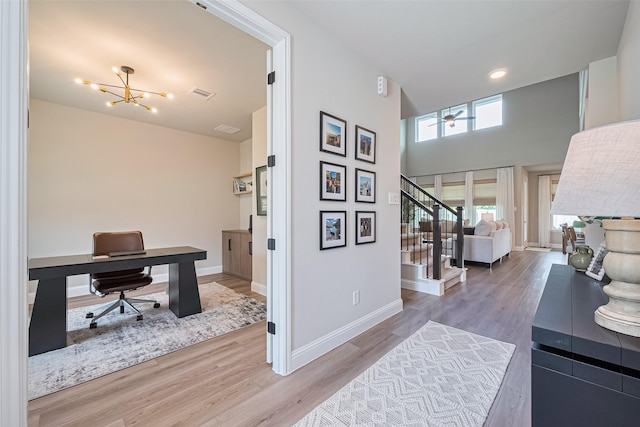 21031 Secretariat Meadow Ln, Tomball, TX 77377 - office with a chandelier, light wood finished floors, and recessed lighting