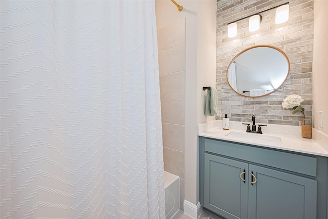 21031 Secretariat Meadow Ln, Tomball, TX 77377 - bathroom featuring vanity and shower / bathtub combination with curtain
