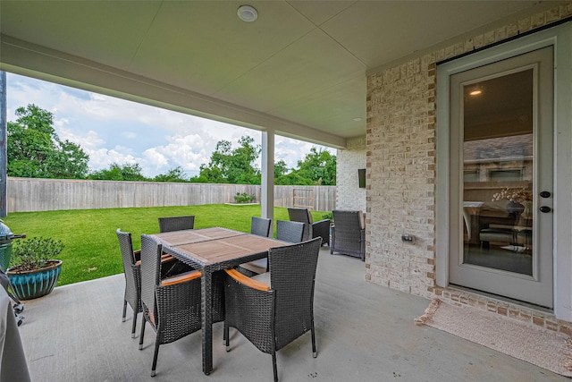 21031 Secretariat Meadow Ln, Tomball, TX 77377 - fenced backyard with outdoor dining space and a patio