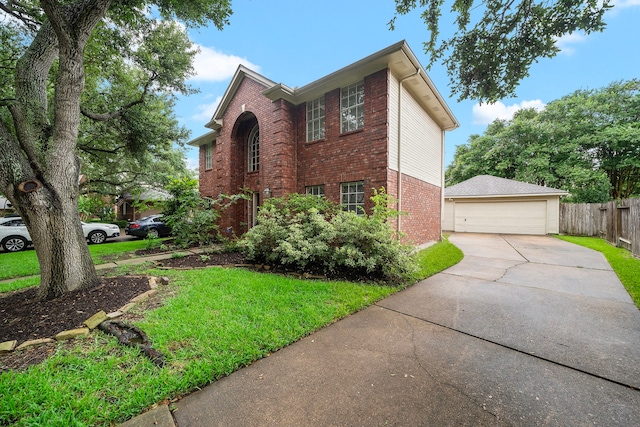 5411 Davids Bend Dr, Sugar Land, TX 77479 - traditional-style home with brick siding, a detached garage, and an outbuilding