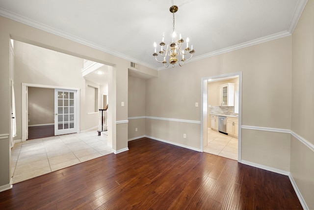 5411 Davids Bend Dr, Sugar Land, TX 77479 - empty room with light wood-type flooring, a chandelier, and crown molding