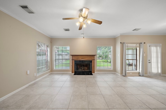 5411 Davids Bend Dr, Sugar Land, TX 77479 - unfurnished living room featuring light tile patterned flooring, a ceiling fan, a tile fireplace, ornamental molding, and plenty of natural light