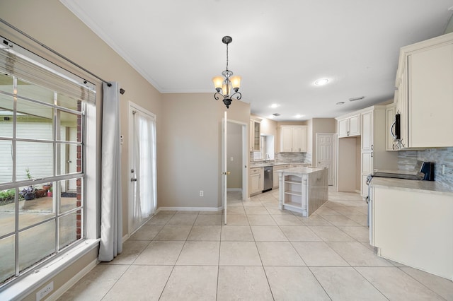 5411 Davids Bend Dr, Sugar Land, TX 77479 - kitchen with appliances with stainless steel finishes, backsplash, a chandelier, light countertops, and ornamental molding