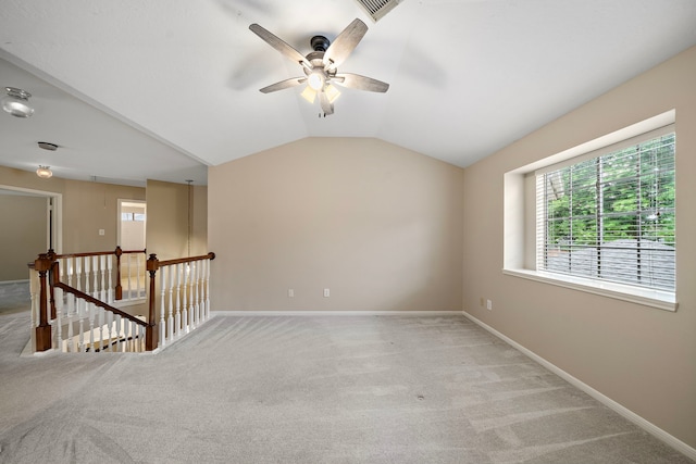 5411 Davids Bend Dr, Sugar Land, TX 77479 - spare room with a ceiling fan, light carpet, and vaulted ceiling