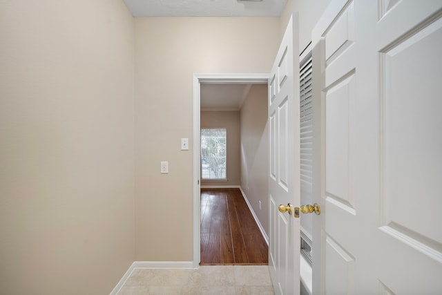 5411 Davids Bend Dr, Sugar Land, TX 77479 - corridor with baseboards and crown molding