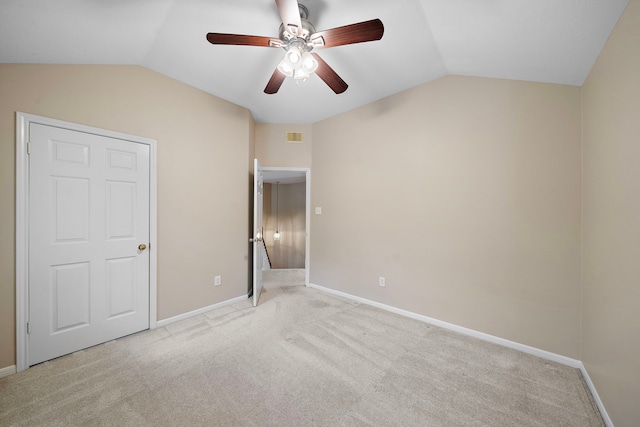 5411 Davids Bend Dr, Sugar Land, TX 77479 - unfurnished bedroom with vaulted ceiling, light carpet, and a ceiling fan