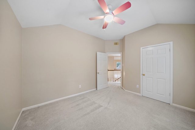 5411 Davids Bend Dr, Sugar Land, TX 77479 - unfurnished bedroom featuring lofted ceiling, light colored carpet, and a ceiling fan