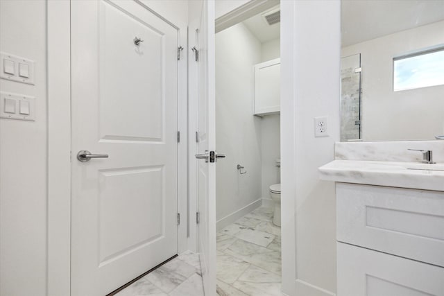 1609 Roy St, Houston, TX 77007 - bathroom with marble finish flooring and vanity