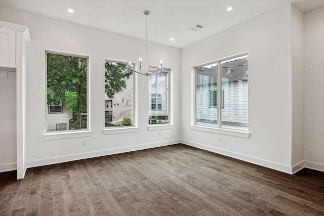 1609 Roy St, Houston, TX 77007 - unfurnished dining area with a chandelier, dark wood-style floors, and recessed lighting