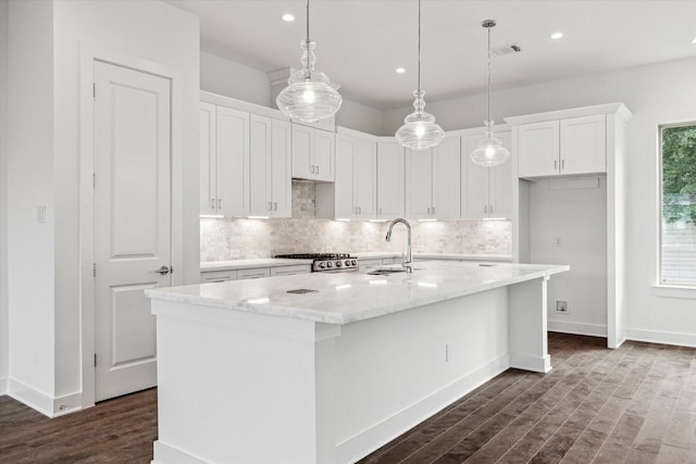 1609 Roy St, Houston, TX 77007 - kitchen featuring tasteful backsplash, range, dark wood-style floors, and recessed lighting